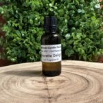 The Lighthouse Candle Factory's exclusive Amaretto Delight fragrance in a 1oz bottle.