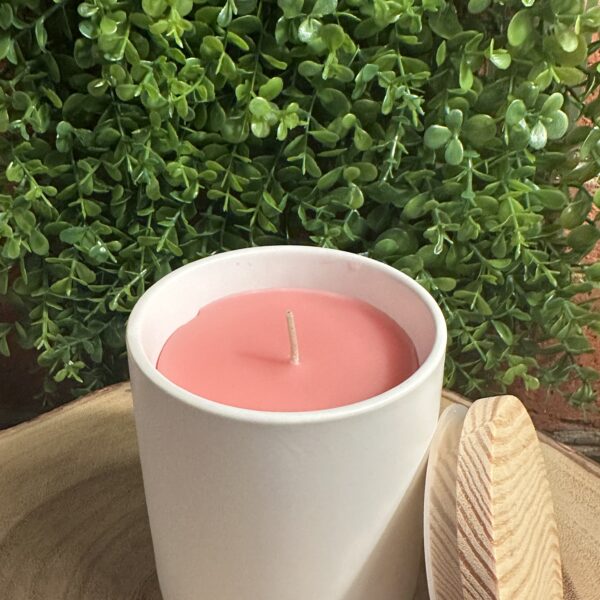 modern white tumbler with pink wax