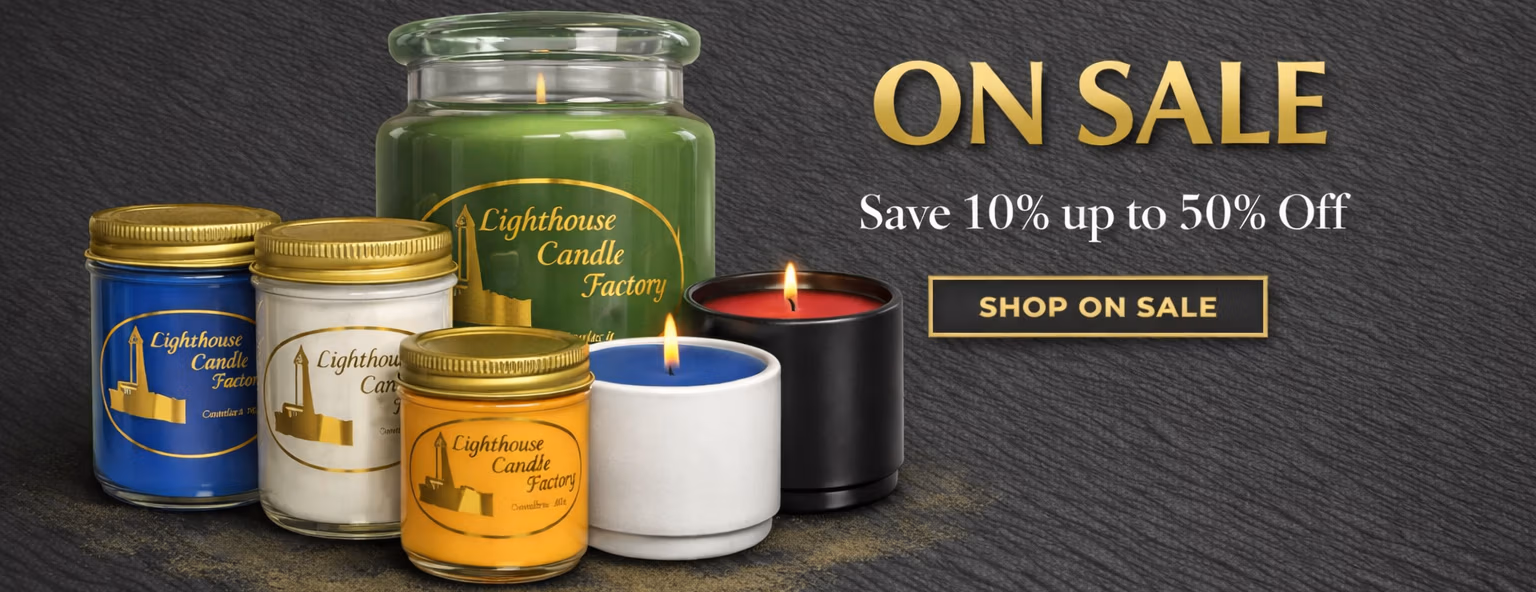 Cluster of candles from The Lighthouse Candle Factory on a charcoal background with gold “On Sale” text and button promoting discounts from 10 % to 50 %.