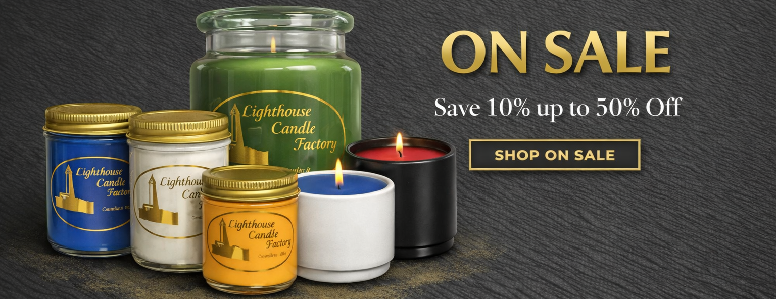 Cluster of candles from The Lighthouse Candle Factory on a charcoal background with gold “On Sale” text and button promoting discounts from 10 % to 50 %.