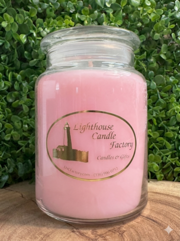 Almond vanilla candle, Amaretto Delight, with pink wax in a clear glass jar