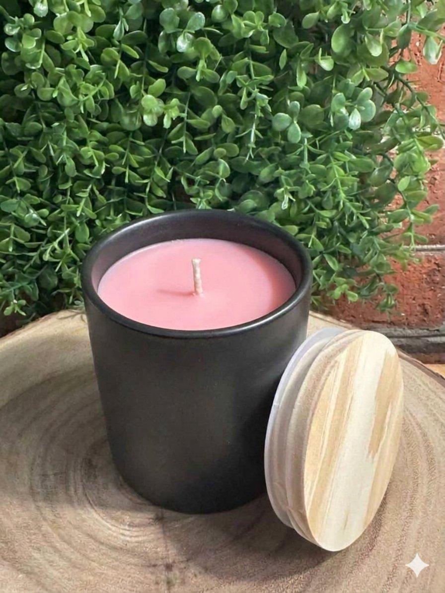 amaretto_delight_black_12oz_modern_ceramic_tumbler Amaretto Delight almond vanilla candle in a black ceramic tumbler with pink wax