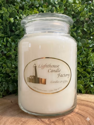 Floral musk candle Amazing Grace in a clear glass jar with pearl white wax