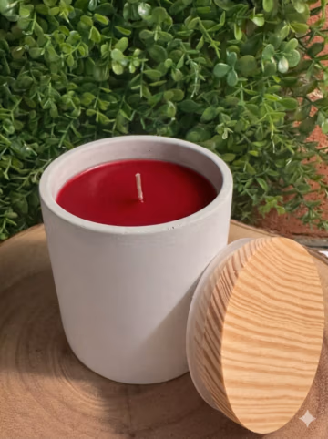 Apple Bourbon candle in a white ceramic vessel with chili red wax — front view