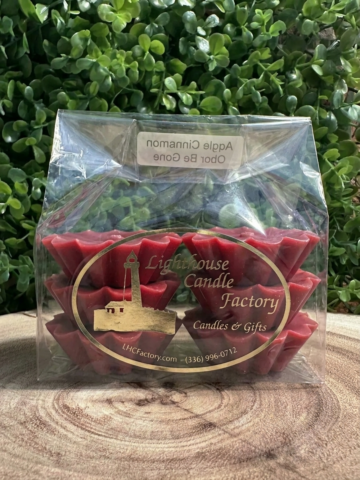 Apple Cinnamon Wax Tarts with crimson red wax in a clear bag with gold printing