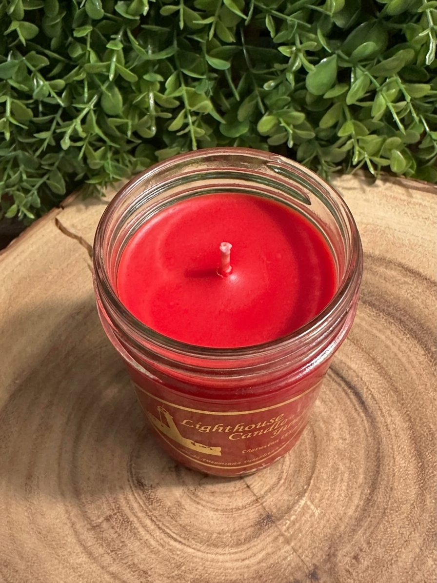 Black Cherry Scented Candle in an 8oz jelly jar candle with red wax — top view