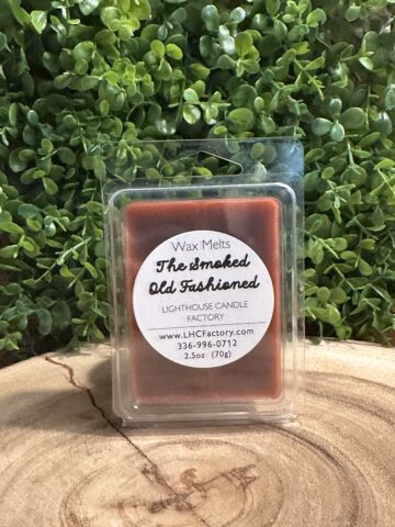 The Smoked Old Fashioned Melts by The Lighthouse Candle Factory in Bourbon color with smoky oak, bourbon, orange bitters, cherry and vanilla fragrance
