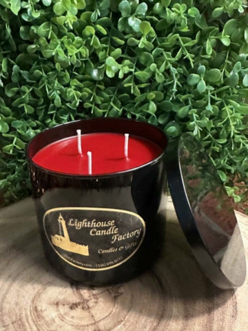 Apple Cinnamon 17oz 3-Wick Candle with crimson red wax in a black glass vessel.